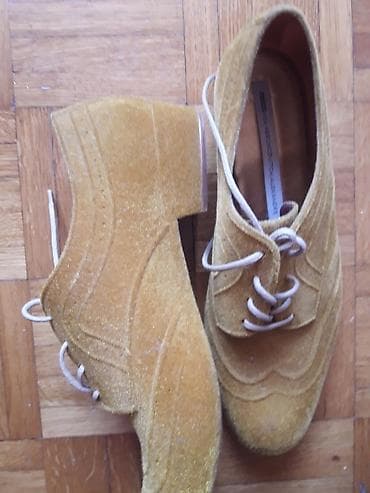 Zenske cipele oker boje materijal kao plis sa sjajem, peta 2cm. par na lalafo.rs Zenske cipele oker boje materijal kao plis sa sjajem, peta 2cm. par