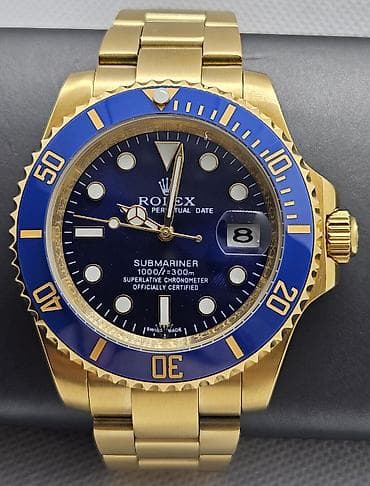 Rolex Submariner Date – zlatni sat sa plavim bezelom i plavim ciferom na lalafo.rs Rolex Submariner Date – zlatni sat sa plavim bezelom i plavim ciferom