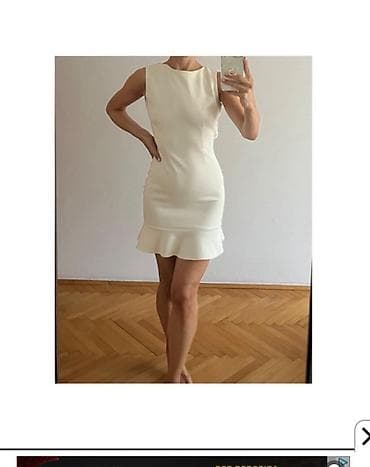 Elegantna mini haljina bez rukava u boji šampanj/belo. odgovara na lalafo.rs — 1 Elegantna mini haljina bez rukava u boji šampanj/belo. odgovara — 1