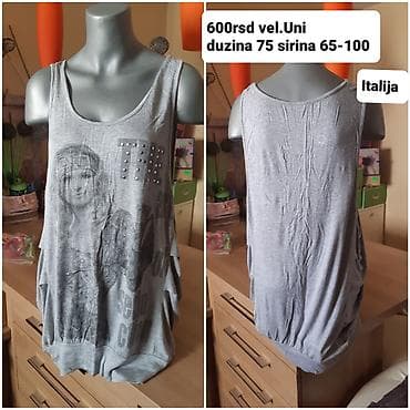 Siva ženska majica bez rukava (tunika) iz Italije. Model je oversize na lalafo.rs Siva ženska majica bez rukava (tunika) iz Italije. Model je oversize