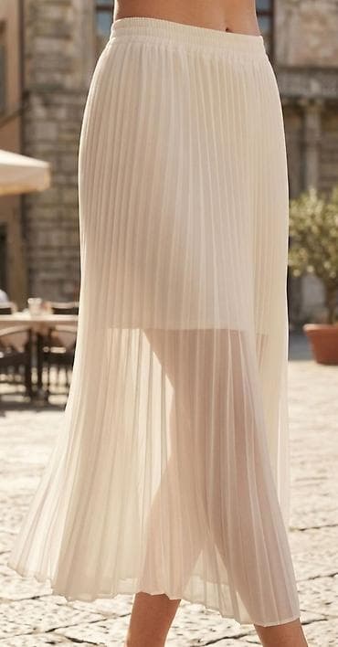 Ženska plisirana suknja – bela - Model: midi dužina, lagano providna na lalafo.rs Ženska plisirana suknja – bela - Model: midi dužina, lagano providna