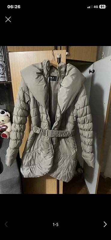 Ženska zimska jakna s kapuljačom u bež/sivoj nijansi. - Model: duža na lalafo.rs Ženska zimska jakna s kapuljačom u bež/sivoj nijansi. - Model: duža