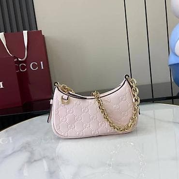 Mini torbica za rame od kože u puder roze boji, sa reljefnim na lalafo.rs — 1 Mini torbica za rame od kože u puder roze boji, sa reljefnim — 1