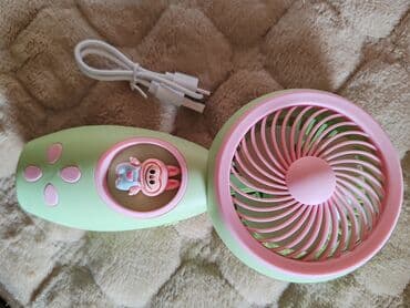 Prenosivi mini ventilator HQ66-30A u zeleno-ružičastoj kombinaciji na lalafo.rs Prenosivi mini ventilator HQ66-30A u zeleno-ružičastoj kombinaciji