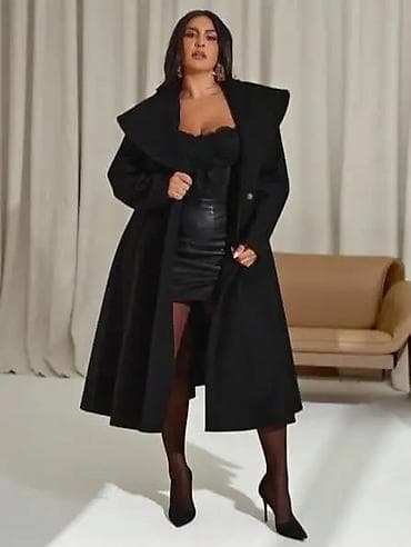 Elegantni crni kaput sa A-kroj siluetom i naglašenim strukom. Model do na lalafo.rs — 5 Elegantni crni kaput sa A-kroj siluetom i naglašenim strukom. Model do — 5