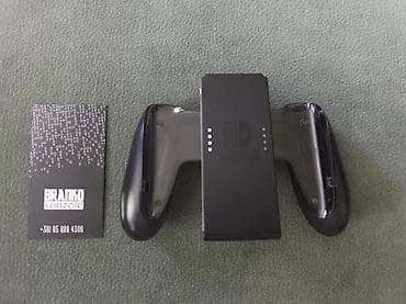 zenske original guess: Original Nintendo Switch JoyCon (joy con) CHARGING Grip Grip + punjac na lalafo.rs — 1 zenske original guess: Original Nintendo Switch JoyCon (joy con) CHARGING Grip Grip + punjac — 1