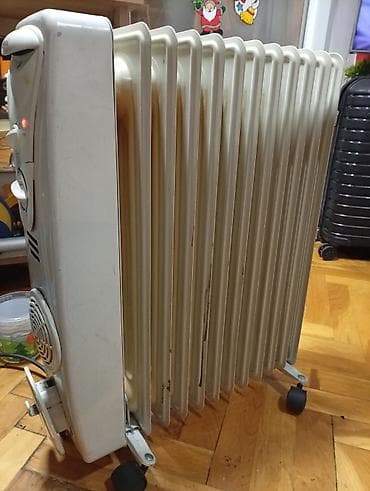 Uljani radijatori: Uljeni radijator Midea sa 12 rebara i ispravnim ventilatorom - Tip na lalafo.rs — 1 Uljani radijatori: Uljeni radijator Midea sa 12 rebara i ispravnim ventilatorom - Tip — 1
