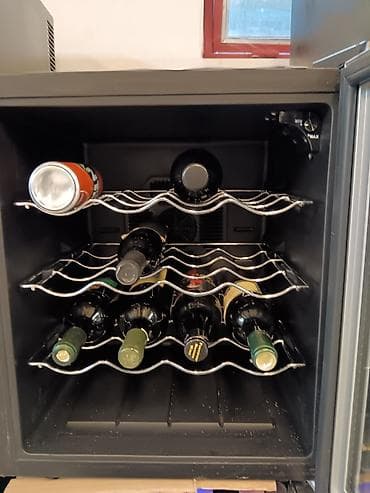 Vinski frižider Waves WC-16007, zapremine 50 l. Karakteristike: - na lalafo.rs — 1 Vinski frižider Waves WC-16007, zapremine 50 l. Karakteristike: - — 1