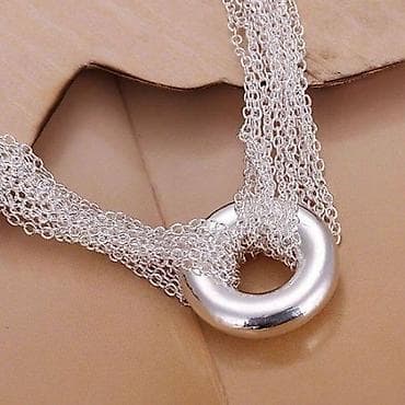 Srebrna višeslojna ogrlica sa T kopčom - Dizajn: masivni okrugli na lalafo.rs Srebrna višeslojna ogrlica sa T kopčom - Dizajn: masivni okrugli