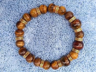 Narukvica Tigrovo Oko 2 - Materijal: poludragi kamen Tigrovo oko na lalafo.rs Narukvica Tigrovo Oko 2 - Materijal: poludragi kamen Tigrovo oko