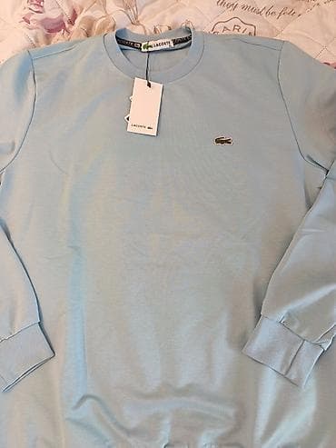 Lacoste muški duks – svetloplavi - Model: klasičan crewneck (okrugli na lalafo.rs Lacoste muški duks – svetloplavi - Model: klasičan crewneck (okrugli