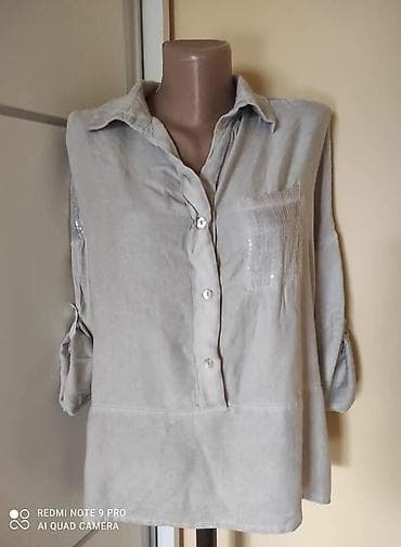 Bluza bež boje iz uvoza kao nova. Sa krljustima. Materijal viskoza na lalafo.rs Bluza bež boje iz uvoza kao nova. Sa krljustima. Materijal viskoza