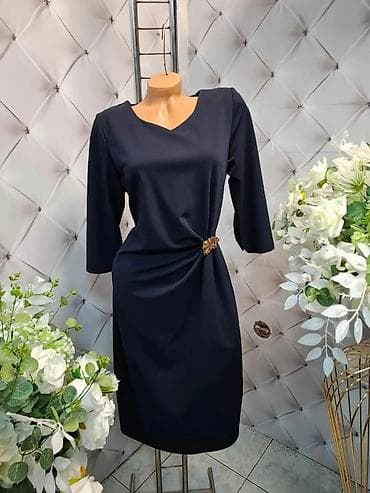 Elegantna ženska haljina – midi dužina, polu-uski kroj sa blagim na lalafo.rs Elegantna ženska haljina – midi dužina, polu-uski kroj sa blagim