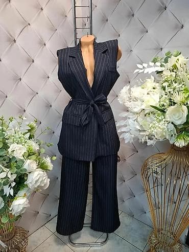 Ženski dvodelni komplet – prsluk i pantalone sa prugama. - Model na lalafo.rs — 2 Ženski dvodelni komplet – prsluk i pantalone sa prugama. - Model — 2