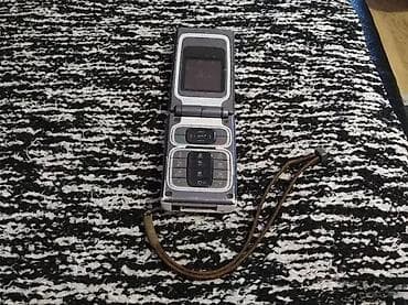 prsluk jaknica mango u: 1. Nokia 7390 2. Nokia 7200 nema bateriju na lalafo.rs — 3 prsluk jaknica mango u: 1. Nokia 7390 2. Nokia 7200 nema bateriju — 3