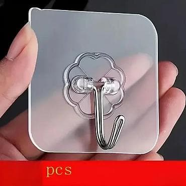 Prozirne samolepljive zidne kuke 10 komada T NOVO. Opis proizvoda na lalafo.rs Prozirne samolepljive zidne kuke 10 komada T NOVO. Opis proizvoda