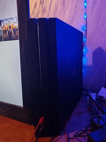 PlayStation 4 Pro konzola (CUH-70xx serija) sa pratećom opremom i na lalafo.rs — 1 PlayStation 4 Pro konzola (CUH-70xx serija) sa pratećom opremom i — 1