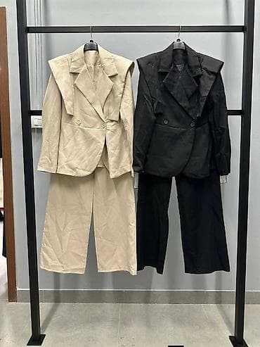 Ženski pantalone-odelo sa širokim nogavicama i struktuiranim blejzerom na lalafo.rs — 3 Ženski pantalone-odelo sa širokim nogavicama i struktuiranim blejzerom — 3