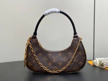 Elegantna torbica, Louis Vuitton, Materijal: Platno na lalafo.rs Elegantna torbica, Louis Vuitton, Materijal: Platno
