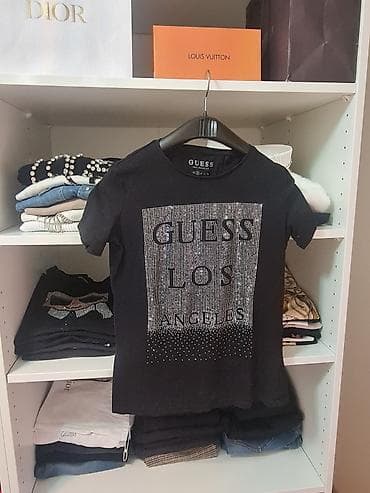 GUESS majica za žene – model “Los Angeles” - Boja: crna - Kratak at lalafo.rs — 1 GUESS majica za žene – model “Los Angeles” - Boja: crna - Kratak — 1