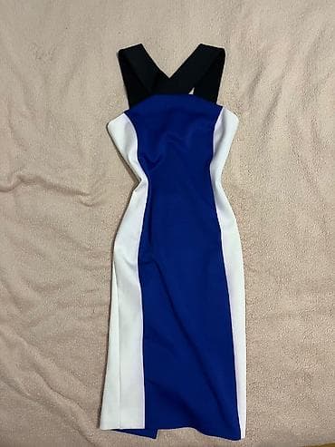 Svečana haljina ispod kolena od skube. Nova, nikada obučena. Broj 36 na lalafo.rs Svečana haljina ispod kolena od skube. Nova, nikada obučena. Broj 36