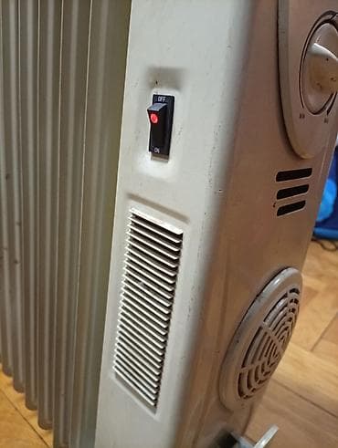 Uljani radijatori: Uljeni radijator Midea sa 12 rebara i ispravnim ventilatorom - Tip na lalafo.rs — 7 Uljani radijatori: Uljeni radijator Midea sa 12 rebara i ispravnim ventilatorom - Tip — 7