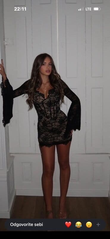 Crna mini haljina od čipke - Model: uska mini haljina sa dugim na lalafo.rs Crna mini haljina od čipke - Model: uska mini haljina sa dugim
