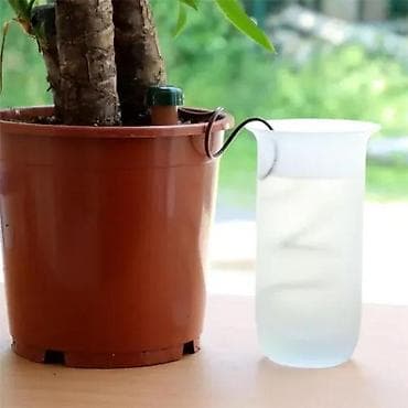 Samozalivni keramički konus za zalivanje sobnih biljaka - Sistem kap na lalafo.rs Samozalivni keramički konus za zalivanje sobnih biljaka - Sistem kap
