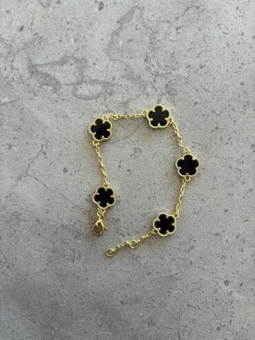 Narukvica - Materijal: zlatno-tonirana lančana karika sa crnim na lalafo.rs — 1 Narukvica - Materijal: zlatno-tonirana lančana karika sa crnim — 1