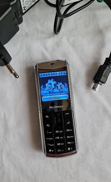 Mc Onsen klasični mobilni telefon sa punjačem - Kompaktan „bar“ na lalafo.rs — 6 Mc Onsen klasični mobilni telefon sa punjačem - Kompaktan „bar“ — 6