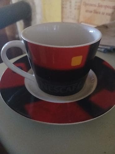 Porcelanske šoljice sa tacnom – Nescafé dizajn. - Materijal na lalafo.rs Porcelanske šoljice sa tacnom – Nescafé dizajn. - Materijal