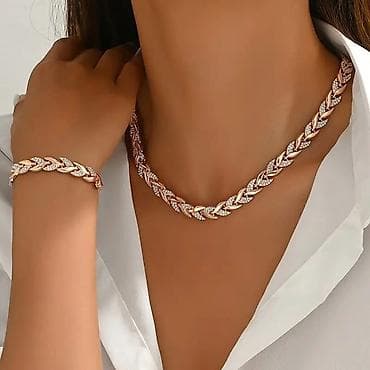 Elegantan set nakita – ogrlica i narukvica - Dizajn: pletena karika u na lalafo.rs Elegantan set nakita – ogrlica i narukvica - Dizajn: pletena karika u