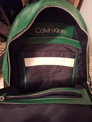 Calvin Klein ranac – trobojni (zelena/bele/crne nijanse) - Materijal na lalafo.rs — 1 Calvin Klein ranac – trobojni (zelena/bele/crne nijanse) - Materijal — 1