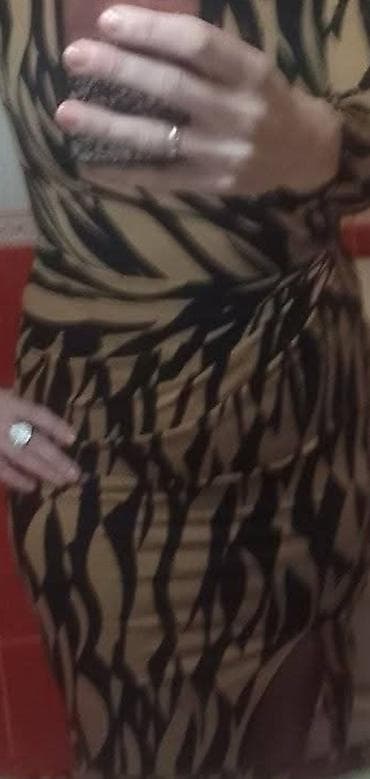 Ženska haljina sa animal/abstraktnim printom u bež-crnoj kombinaciji na lalafo.rs — 1 Ženska haljina sa animal/abstraktnim printom u bež-crnoj kombinaciji — 1