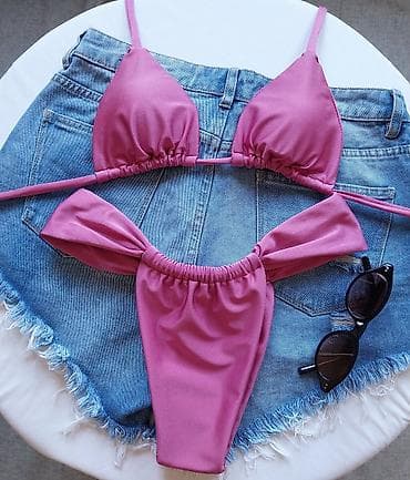 Ružičasti bikini set – trouglasti gornji deo i donji deo sa mašnama sa na lalafo.rs Ružičasti bikini set – trouglasti gornji deo i donji deo sa mašnama sa