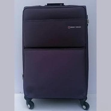 Travel suitcases and bags: Reddy Wenge kofer na točkiće – tekstilni, tamnoljubičaste boje at lalafo.rs — 1 Travel suitcases and bags: Reddy Wenge kofer na točkiće – tekstilni, tamnoljubičaste boje — 1