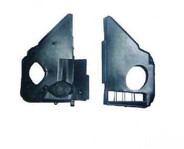 Dva crna, oblikovana plastična panela, dizajnirana verovatno za na lalafo.rs Dva crna, oblikovana plastična panela, dizajnirana verovatno za