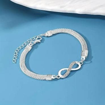 Nježna narukvica sa simbolom beskonačnosti u srebrnoj boji. - na lalafo.rs — 1 Nježna narukvica sa simbolom beskonačnosti u srebrnoj boji. - — 1