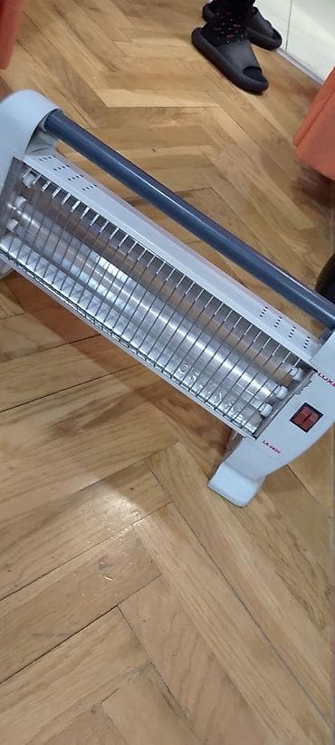 Kvarcne grejalice: Grejalica LX kvarcna 1800w sa tri staklena ispravna grejača Ispravna na lalafo.rs — 9 Kvarcne grejalice: Grejalica LX kvarcna 1800w sa tri staklena ispravna grejača Ispravna — 9