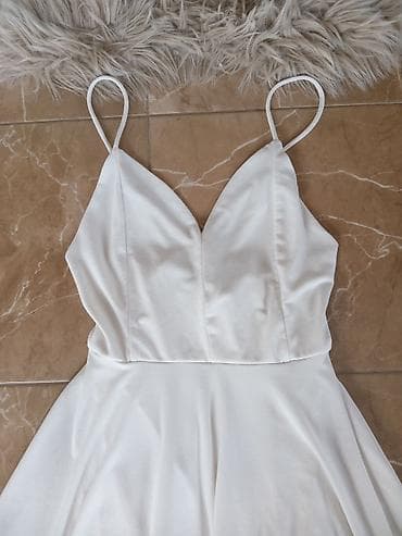 Belo mini haljina na bretele - Model: A-kroja sa lepršavom suknjom - na lalafo.rs — 2 Belo mini haljina na bretele - Model: A-kroja sa lepršavom suknjom - — 2