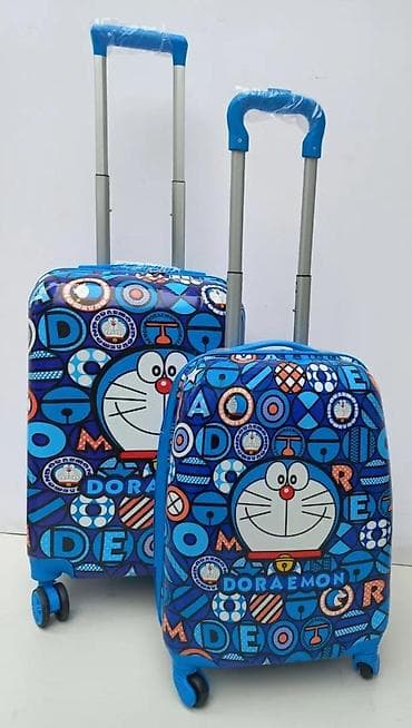 Travel suitcases and bags: Set kofera Doraemon – 2 komada - Dizajn: šareni plavi print sa likom at lalafo.rs — 4 Travel suitcases and bags: Set kofera Doraemon – 2 komada - Dizajn: šareni plavi print sa likom — 4