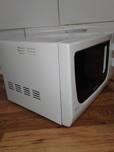 Samsung mikrotalasna rerna sa grill funkcijom - Model sa mehaničkim na lalafo.rs — 4 Samsung mikrotalasna rerna sa grill funkcijom - Model sa mehaničkim — 4