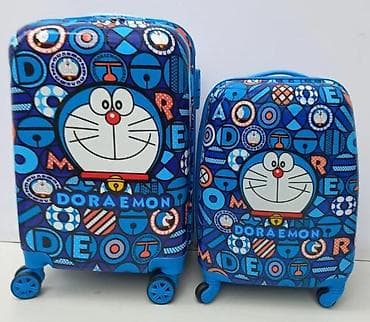Travel suitcases and bags: Set kofera Doraemon – 2 komada - Dizajn: šareni plavi print sa likom at lalafo.rs — 1 Travel suitcases and bags: Set kofera Doraemon – 2 komada - Dizajn: šareni plavi print sa likom — 1