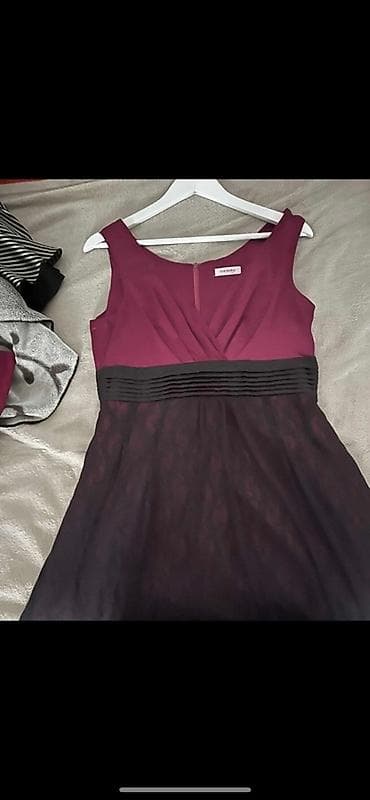 Velicina 40.Elegantna ženska haljina bez rukava, midi dužine. Gornji na lalafo.rs — 4 Velicina 40.Elegantna ženska haljina bez rukava, midi dužine. Gornji — 4