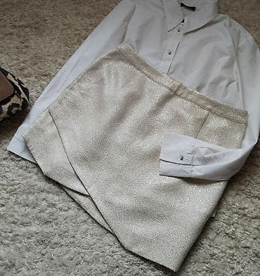 Marks Spencer sjajnog krem materijala u velicini 42/XL. Perfektno na lalafo.rs Marks Spencer sjajnog krem materijala u velicini 42/XL. Perfektno
