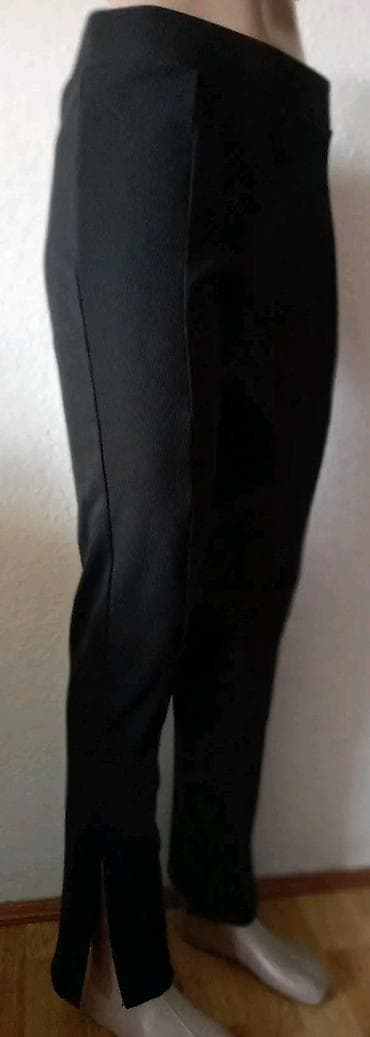 Crne ženske pantalone od rebrastog (rib) materijala, elegantnog i na lalafo.rs — 2 Crne ženske pantalone od rebrastog (rib) materijala, elegantnog i — 2