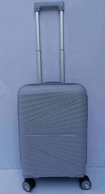 dve suknje po: Tvrdi kofer na točkiće – kabinski format - Materijal: otporna at lalafo.rs — 7 dve suknje po: Tvrdi kofer na točkiće – kabinski format - Materijal: otporna — 7