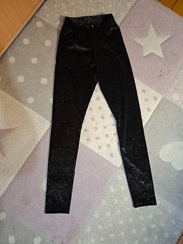 Crne šljokičaste helanke - Brend: Amadeus - Materijal: elastična na lalafo.rs — 1 Crne šljokičaste helanke - Brend: Amadeus - Materijal: elastična — 1