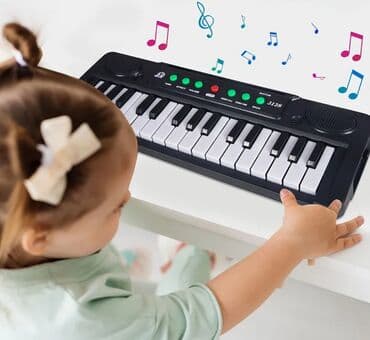 Guitars: Преносиви електронски клавијатурски клавир са 31 тастером са USB at lalafo.rs — 2 Guitars: Преносиви електронски клавијатурски клавир са 31 тастером са USB — 2