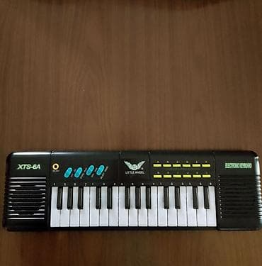 Elektronska klavijatura Little Angel XTS-6A sa 29 standardnih topli. - na lalafo.rs — 2 Elektronska klavijatura Little Angel XTS-6A sa 29 standardnih topli. - — 2